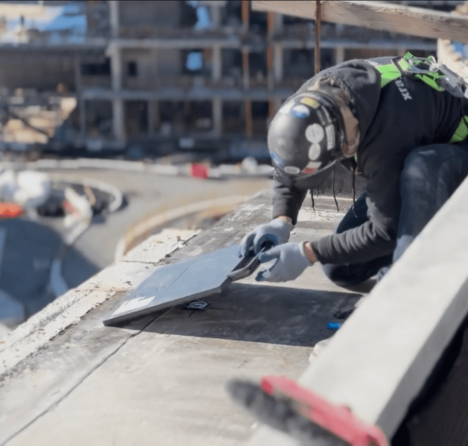 Technician placing the digital panel on the opposite side of the slab